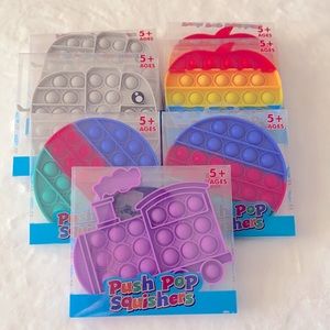 Lot of 7 Fidget Pop It Toys- New in Package $49 Retail Value
